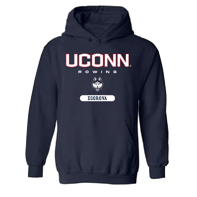 UConn - NCAA Women's Rowing : Polina Egorova - Classic Shersey Hooded Sweatshirt Hoodie with Hem Frayed Vintage Worn UConn - NCAA Women's Rowing : Polina Egorova - Classic Shersey Hooded Sweatshirt Hoodie with Hem Frayed Vintage Worn